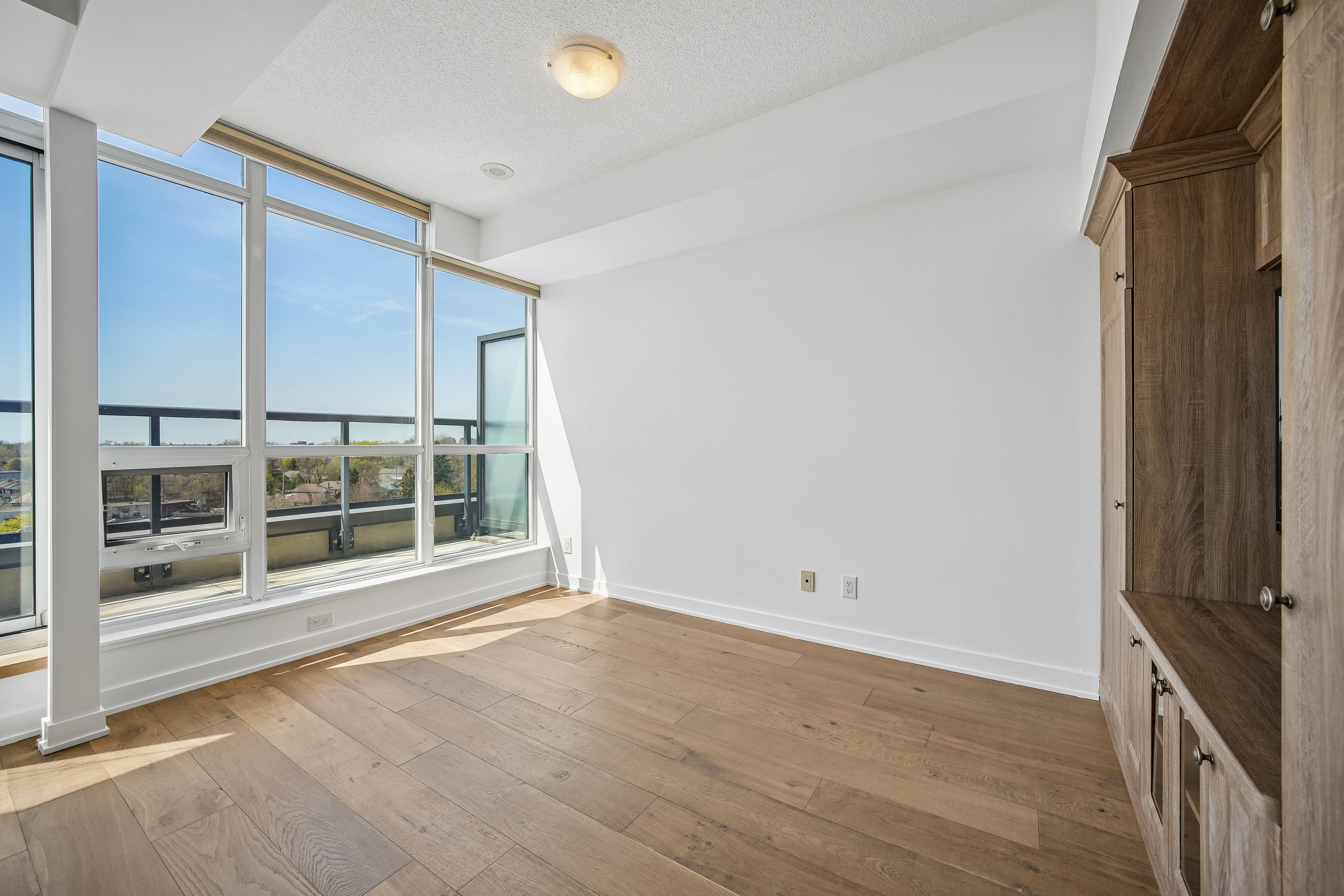 Open-concept living with floor-to-ceiling windows