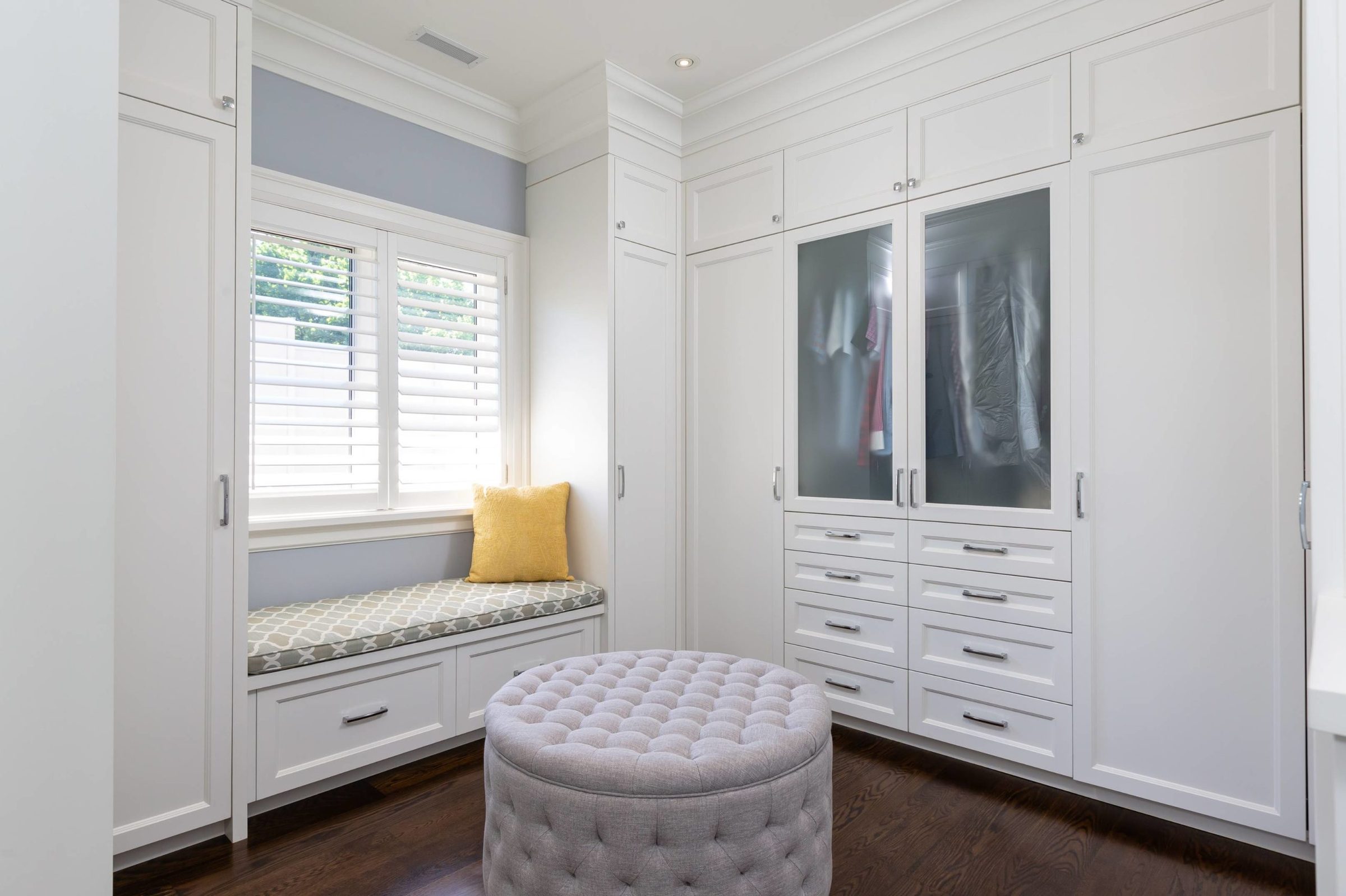 Sprawling dressing room with custom cabinetry
