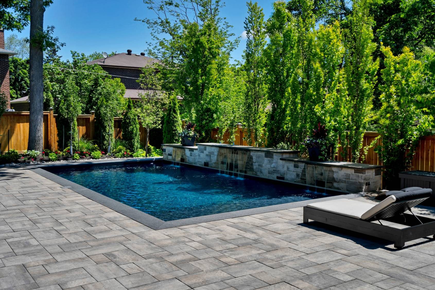 Salt-water pool and resort-inspired gardens