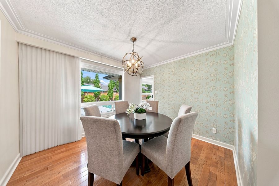 Dining room overlooking the pool and mature landscaping — 16 Oldham Road