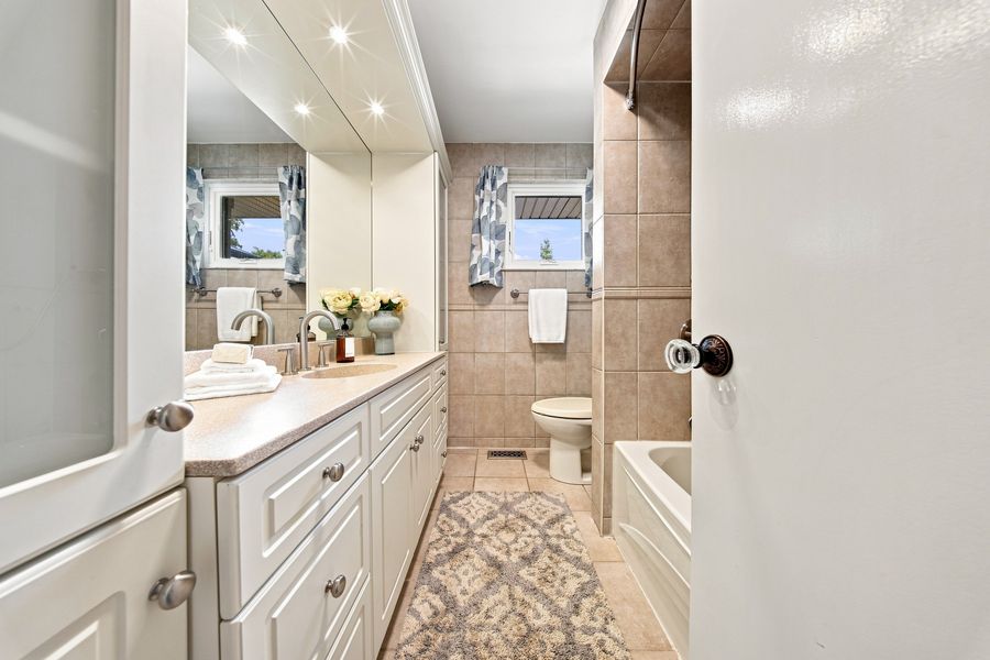 Four-piece main bathroom with double vanity — 16 Oldham Road