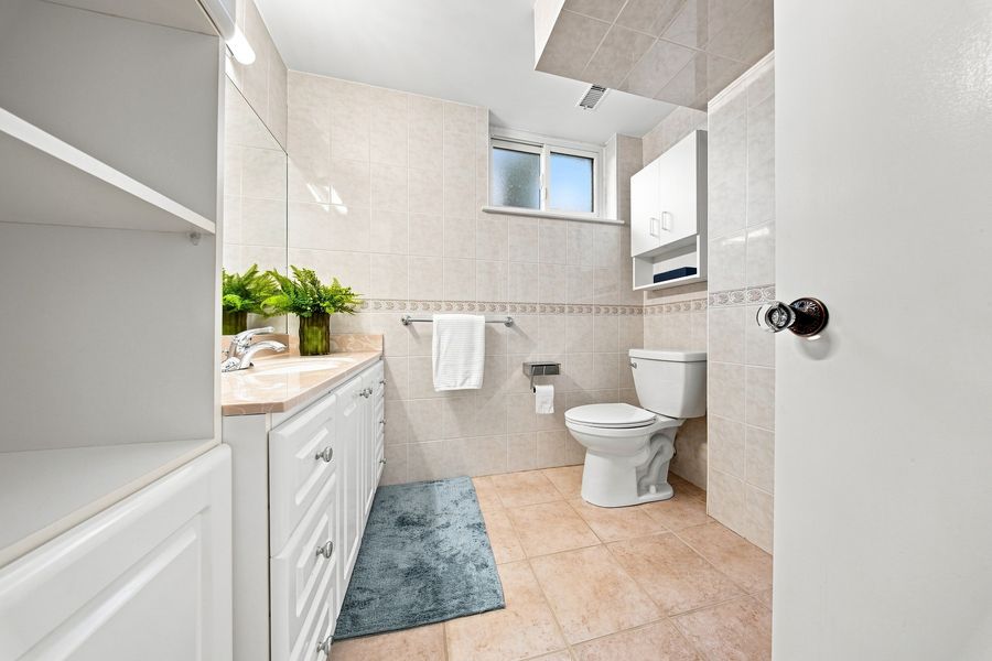 Full three-piece bathroom on the lower level — 16 Oldham Road