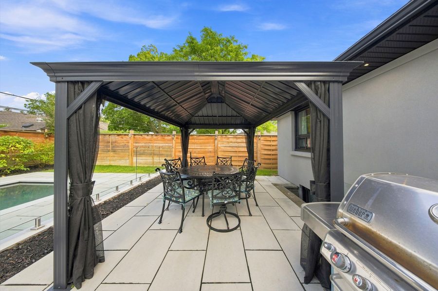 Custom aluminium pergola beside the pool — 16 Oldham Road