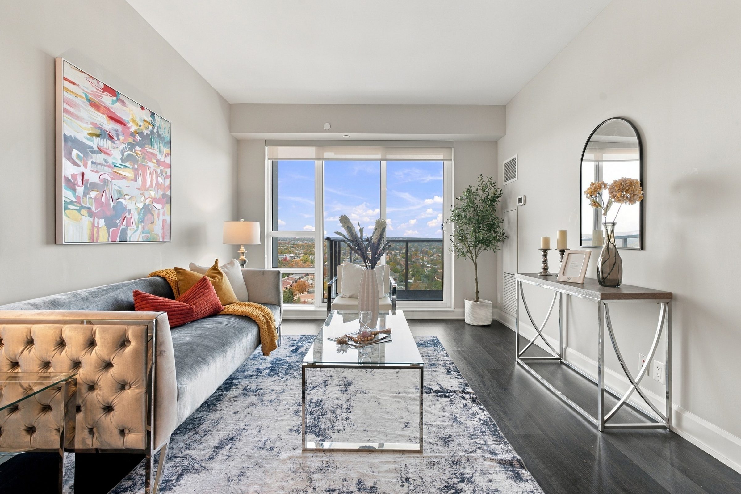 Living and dining room facing the windows at Suite 1902, 38 Gandhi Lane, Markham