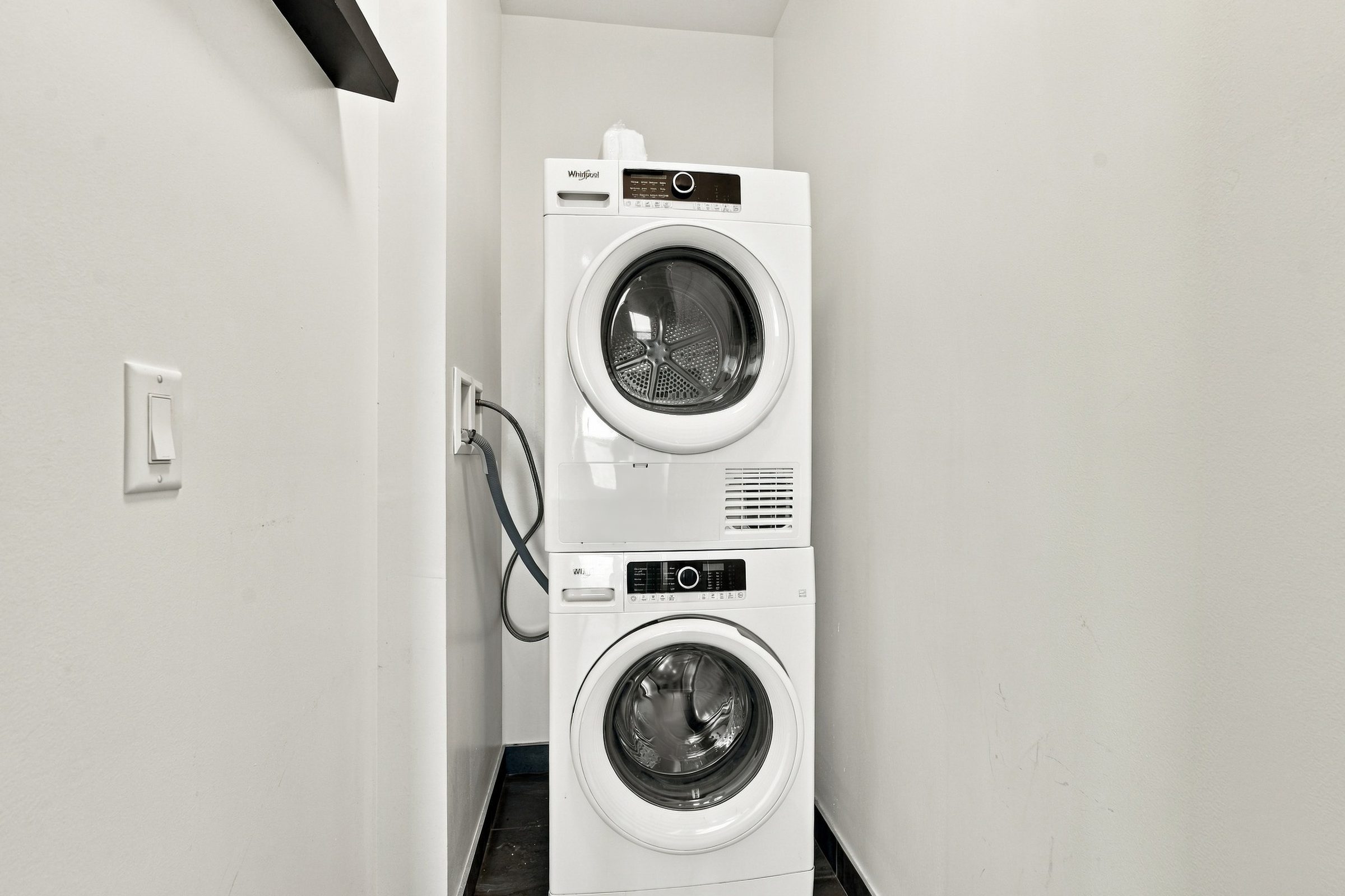 In-suite stacked washer and dryer at Suite 1902, 38 Gandhi Lane, Markham