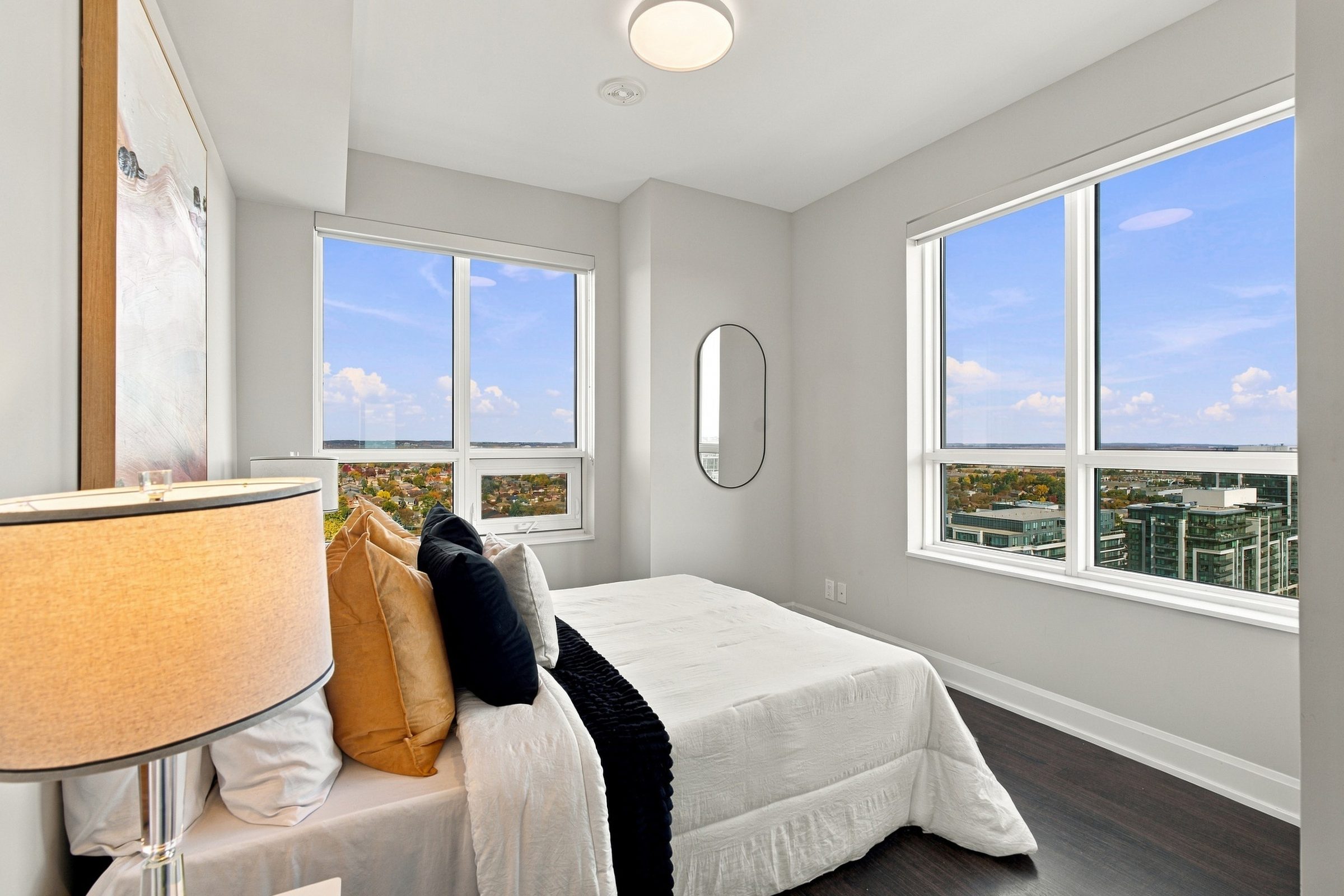 Corner primary bedroom with windows on two walls at Suite 1902, 38 Gandhi Lane, Markham