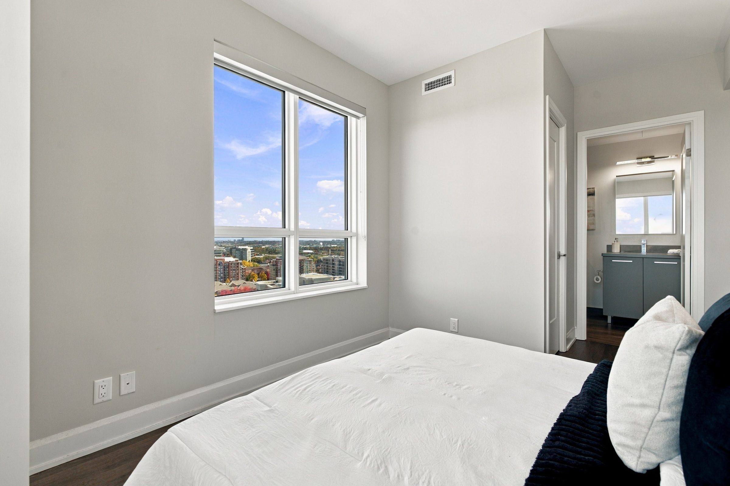 Primary bedroom opening to the ensuite at Suite 1902, 38 Gandhi Lane, Markham