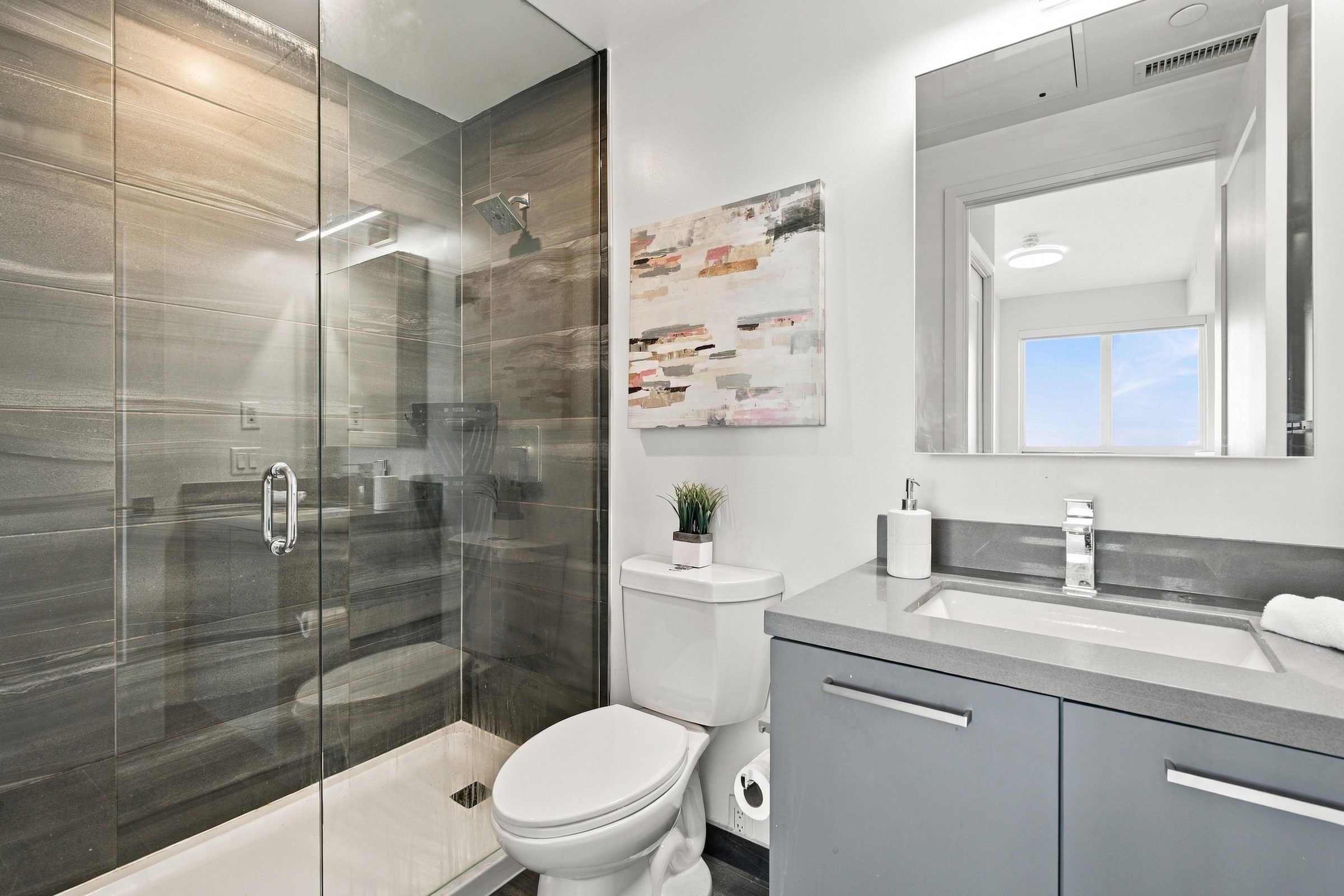 Primary ensuite with glass-enclosed shower at Suite 1902, 38 Gandhi Lane, Markham