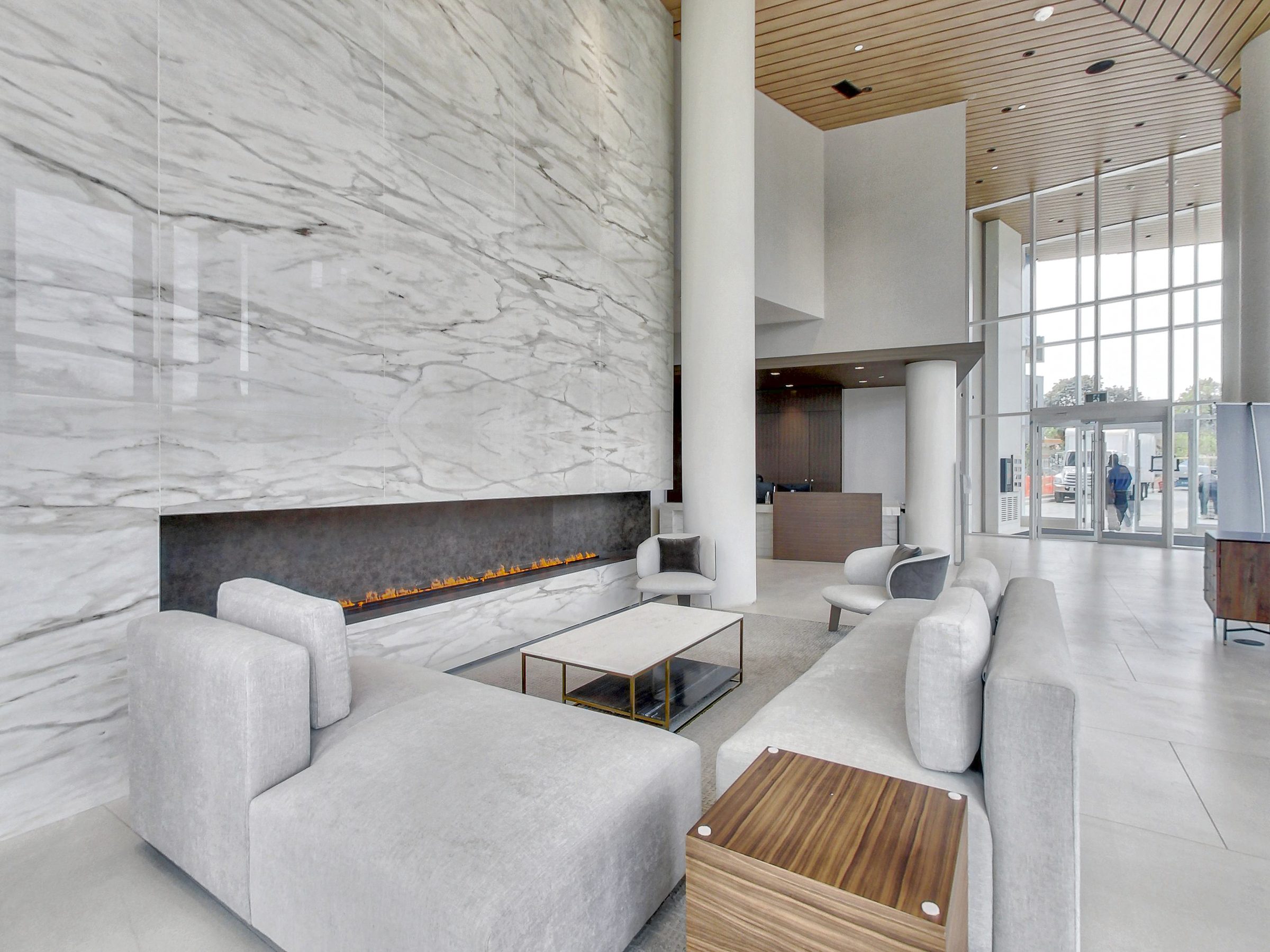 Residents' lounge with fireplace and river-valley outlook