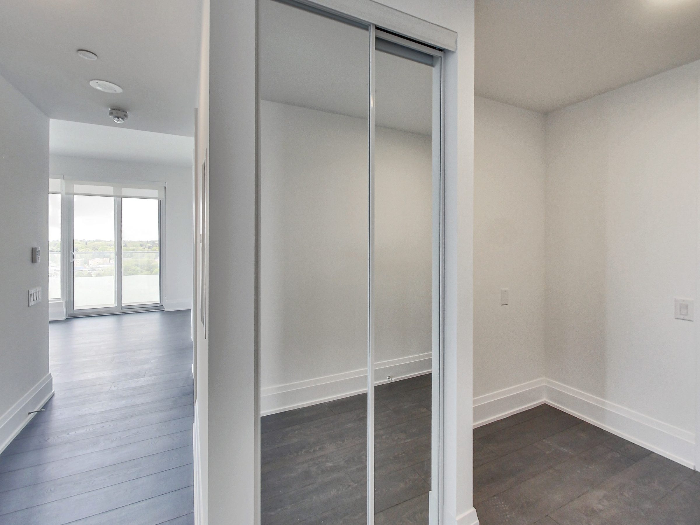 Mirrored double closets and dressing area
