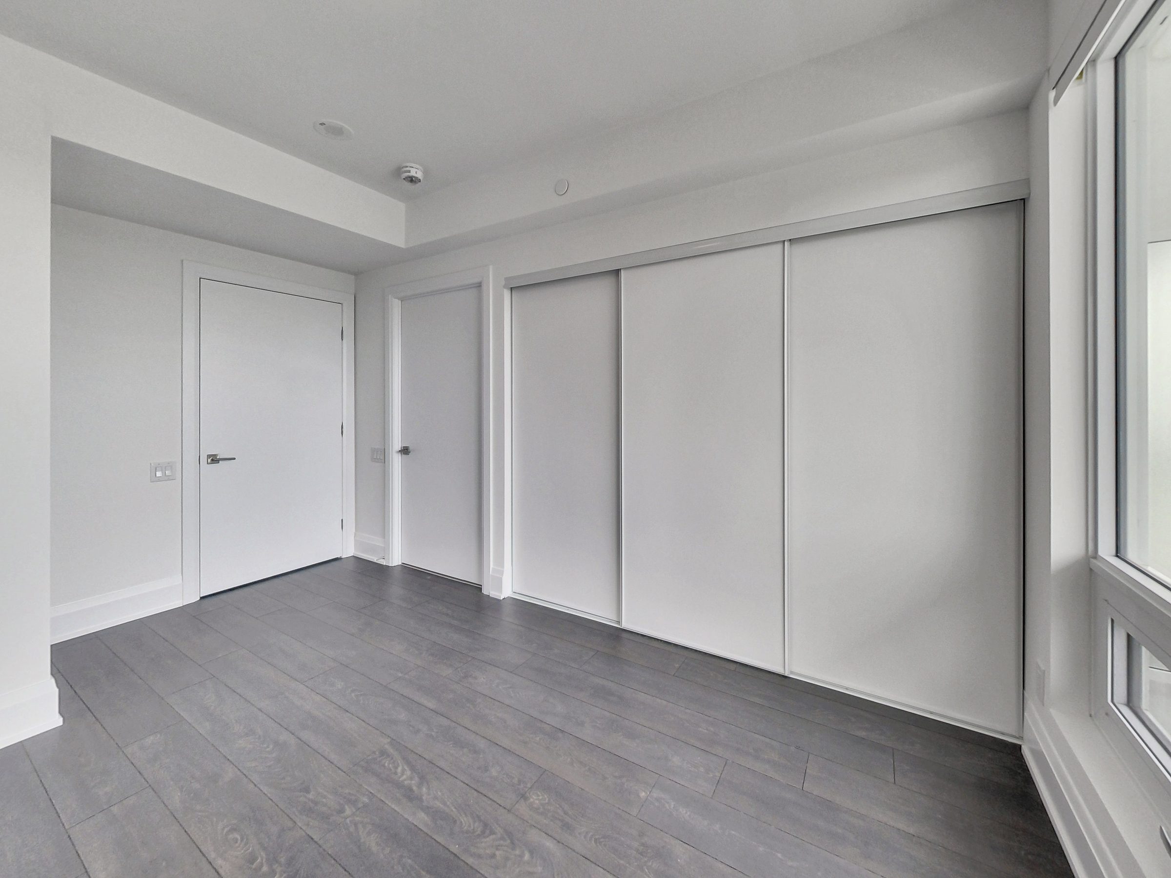 Second bedroom with built-in closet space
