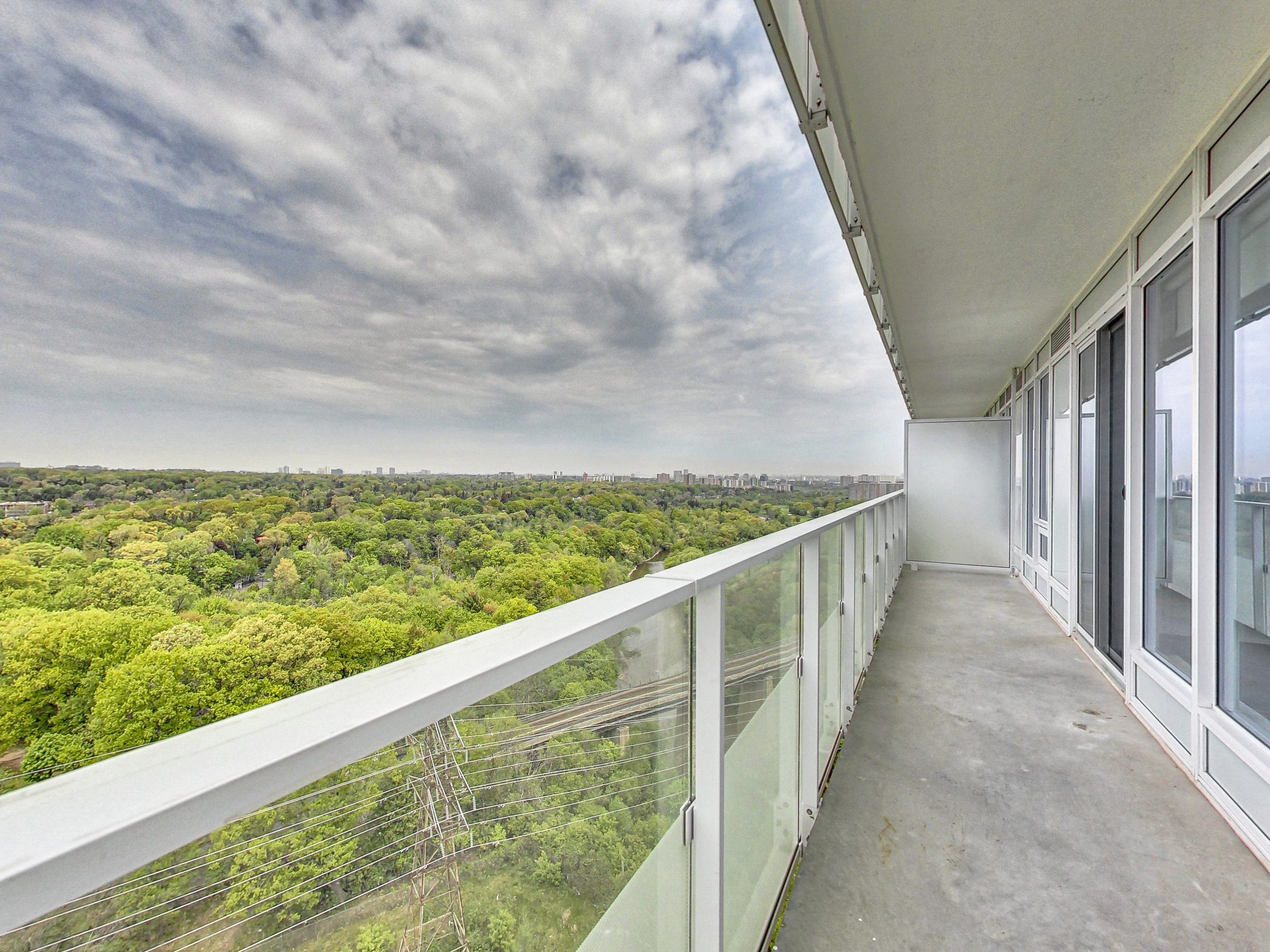 The wraparound balcony overlooking the Humber River and treetops