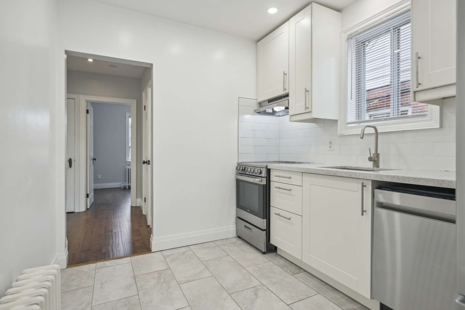 Kitchen with full-height cabinetry and stainless range