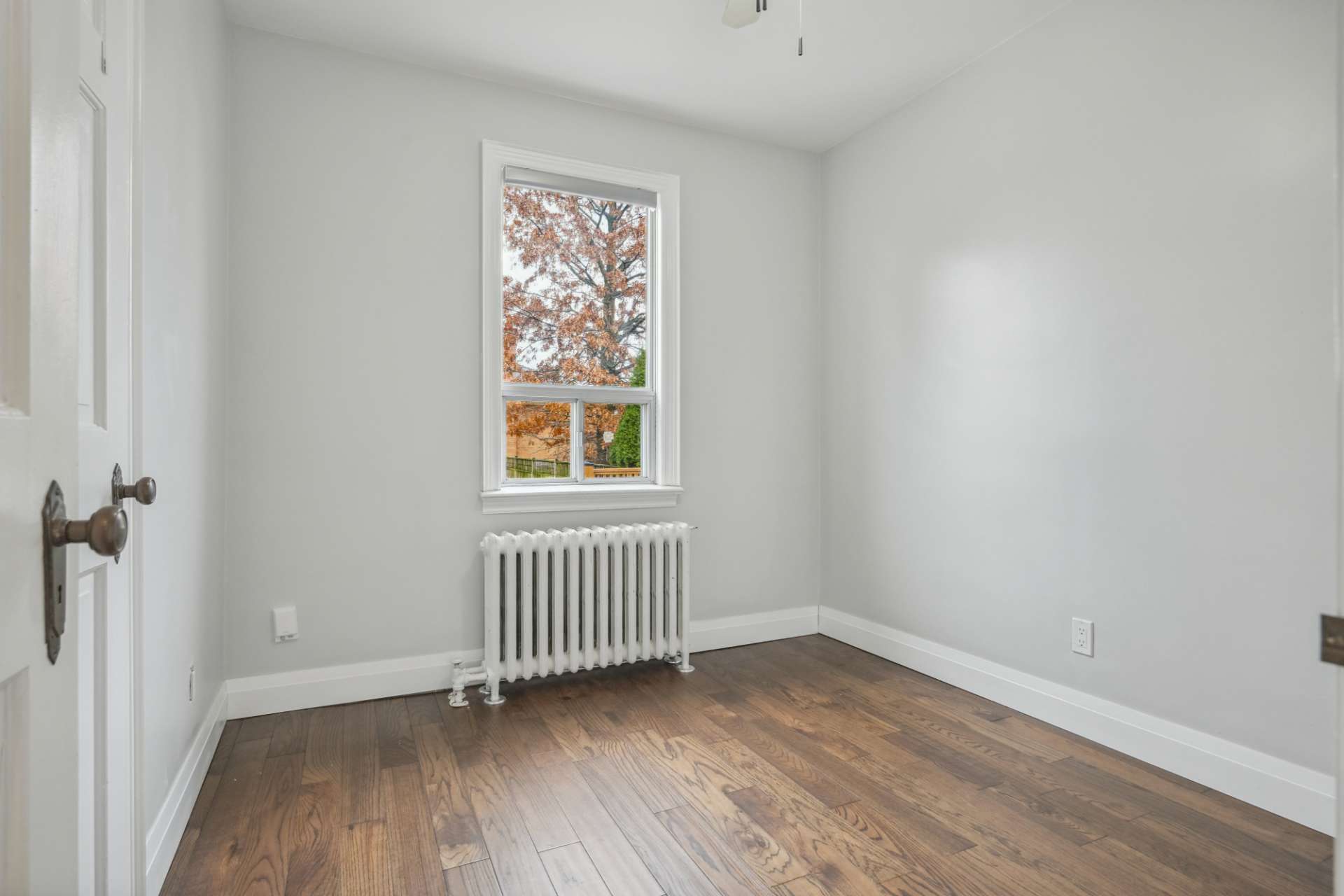Generous bedroom overlooking the yard