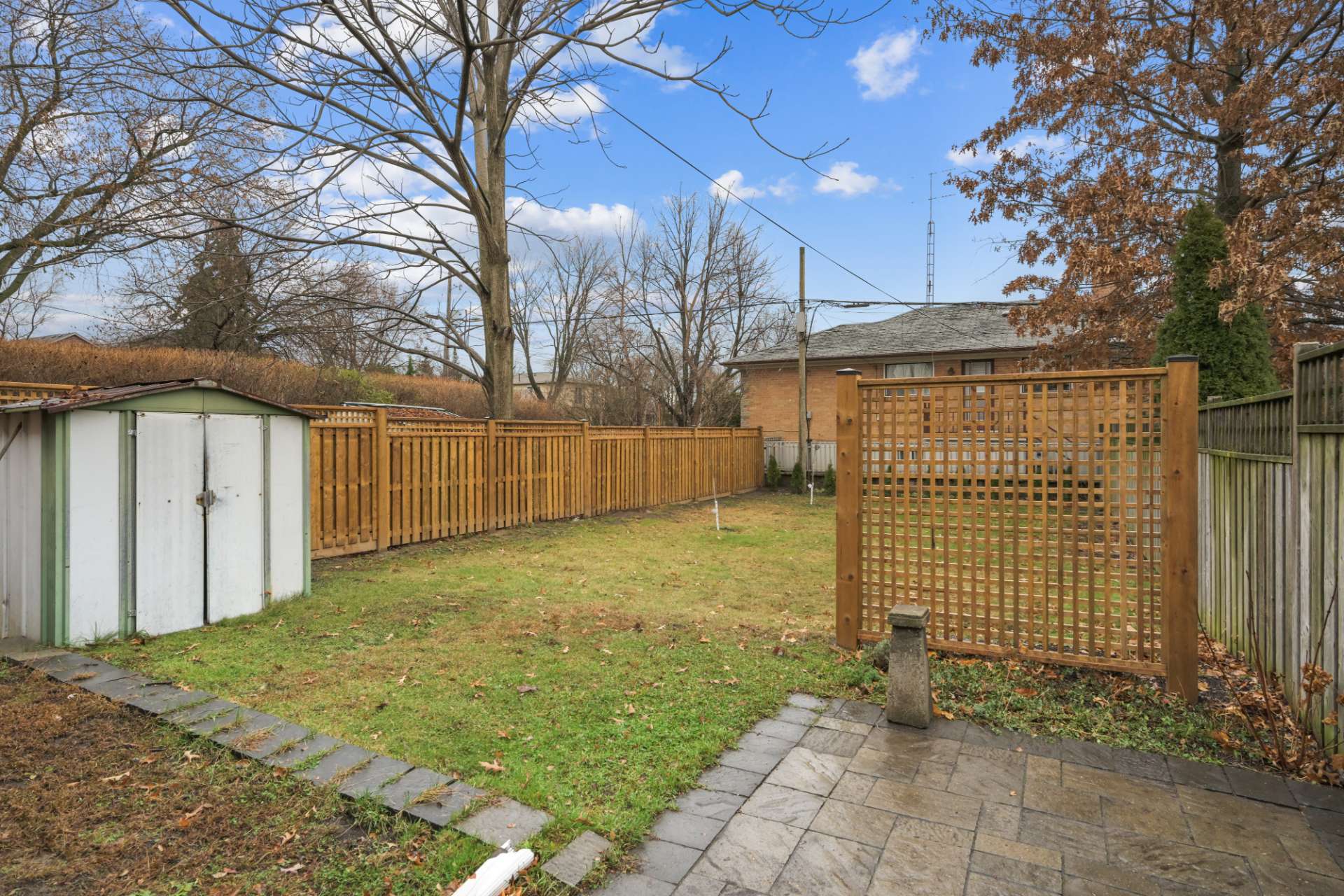 Private yard with garden shed