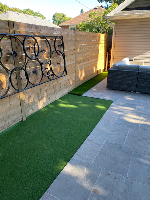 Putting green and landscaped side yard