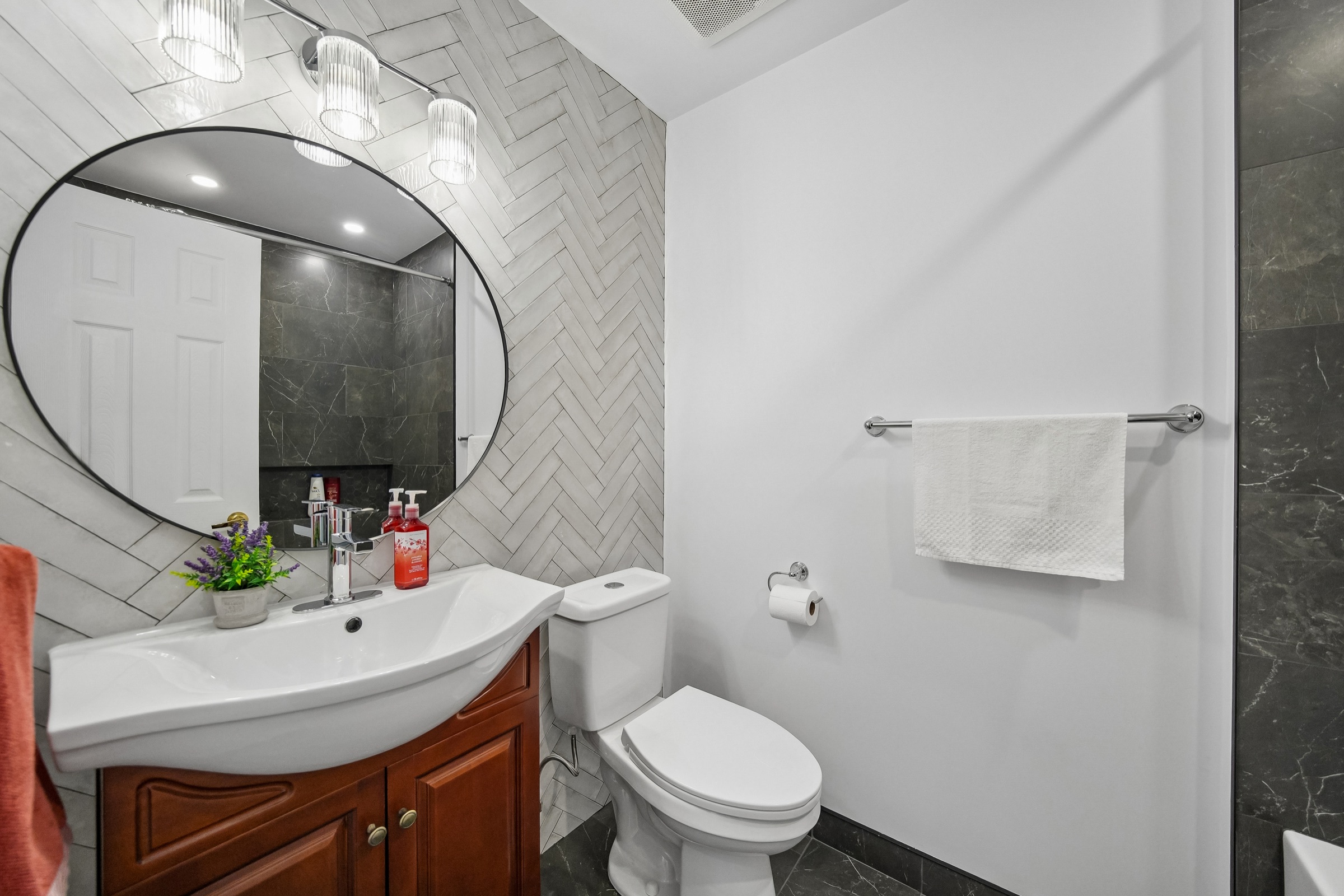 Updated second bath with herringbone tile