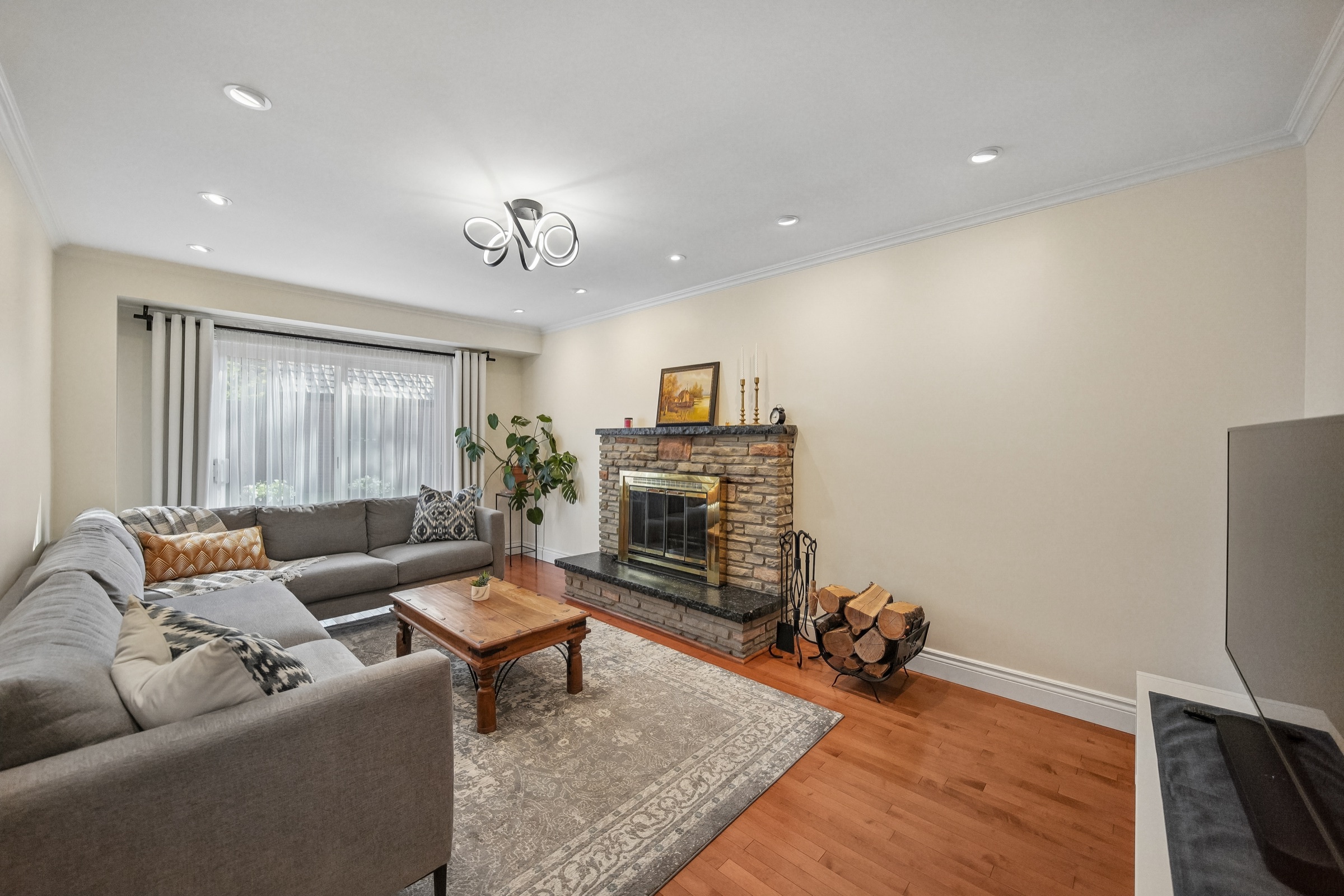 Family room with wood-burning fireplace