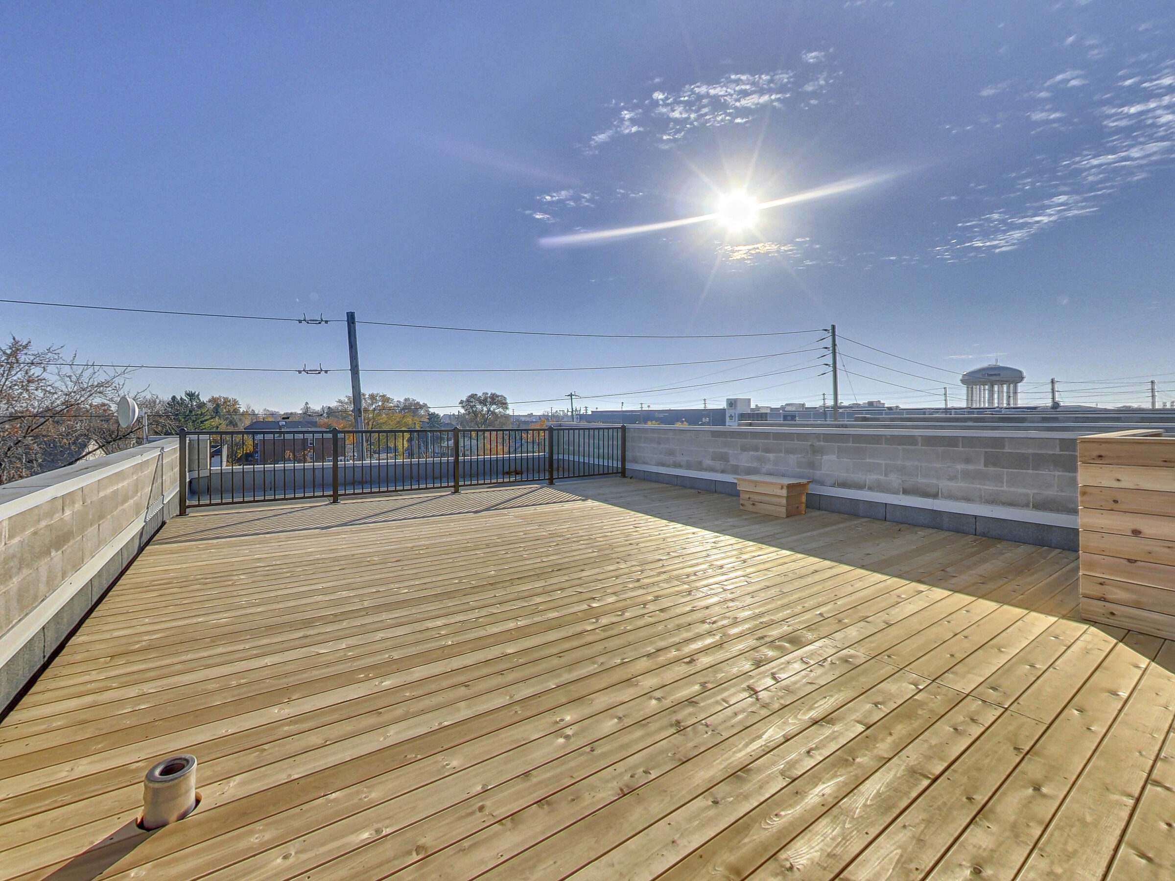Private rooftop deck above 300 New Toronto Street