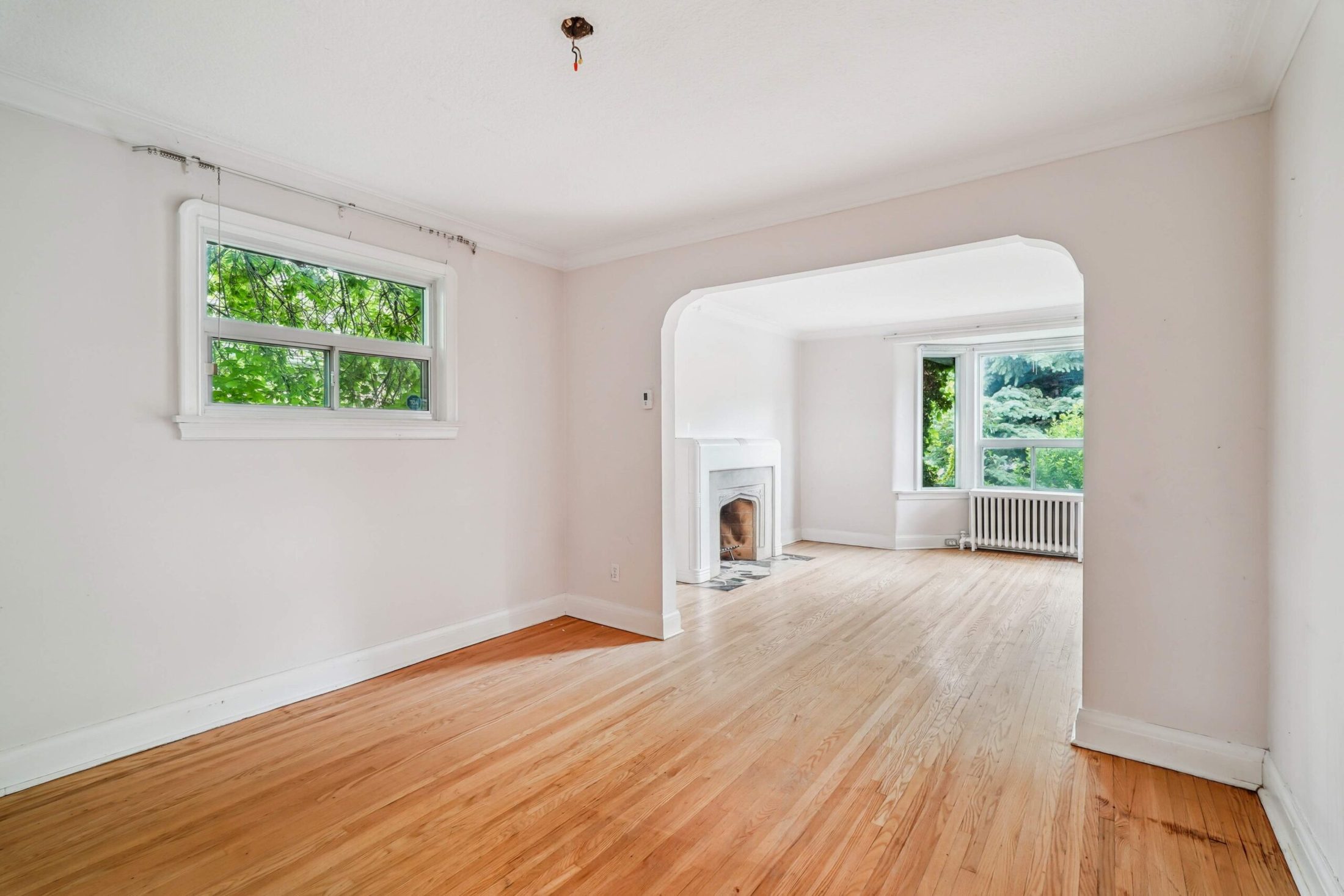 Arched passage connecting the principal living and dining rooms
