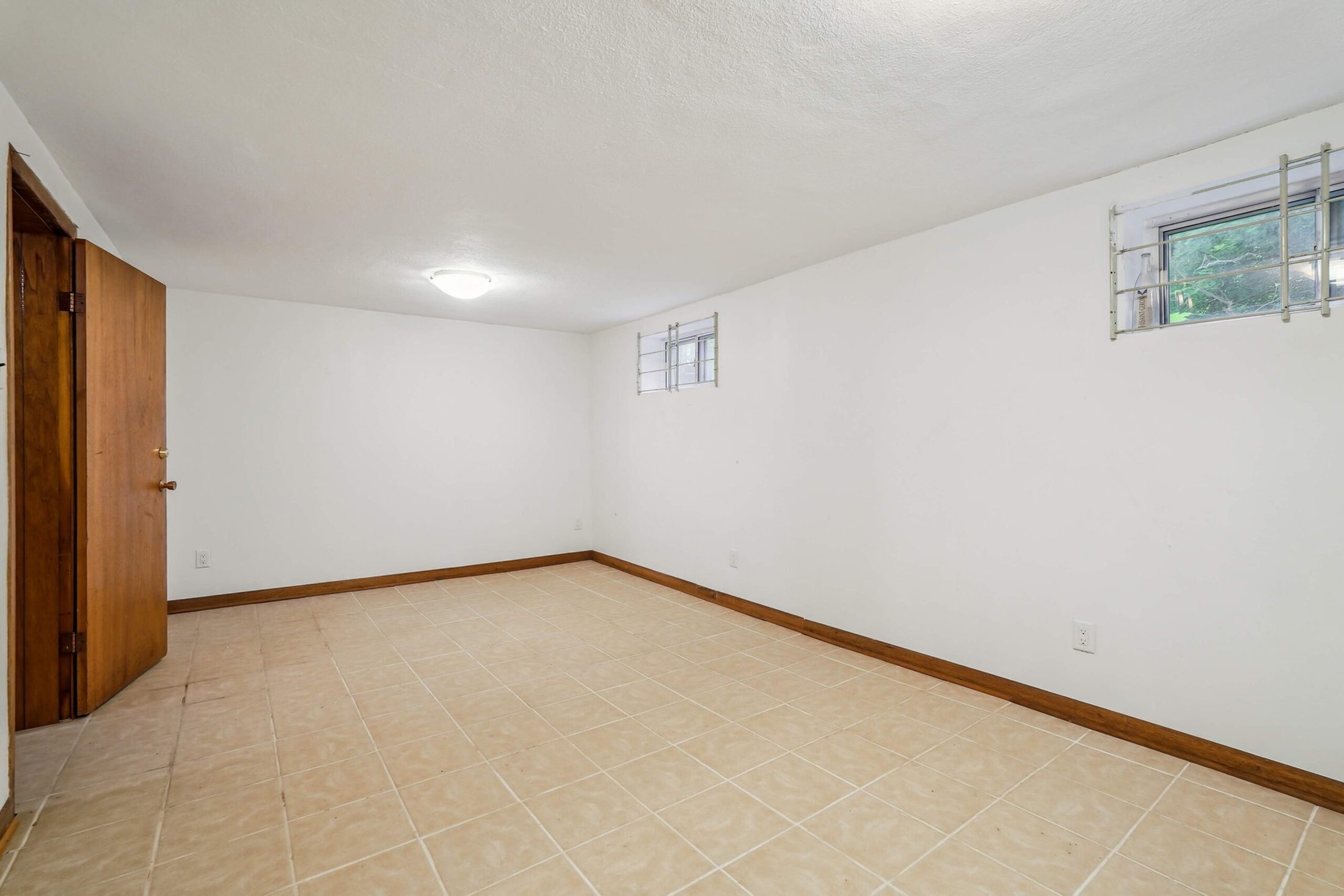 Lower-level recreation space offering flexible additional living area