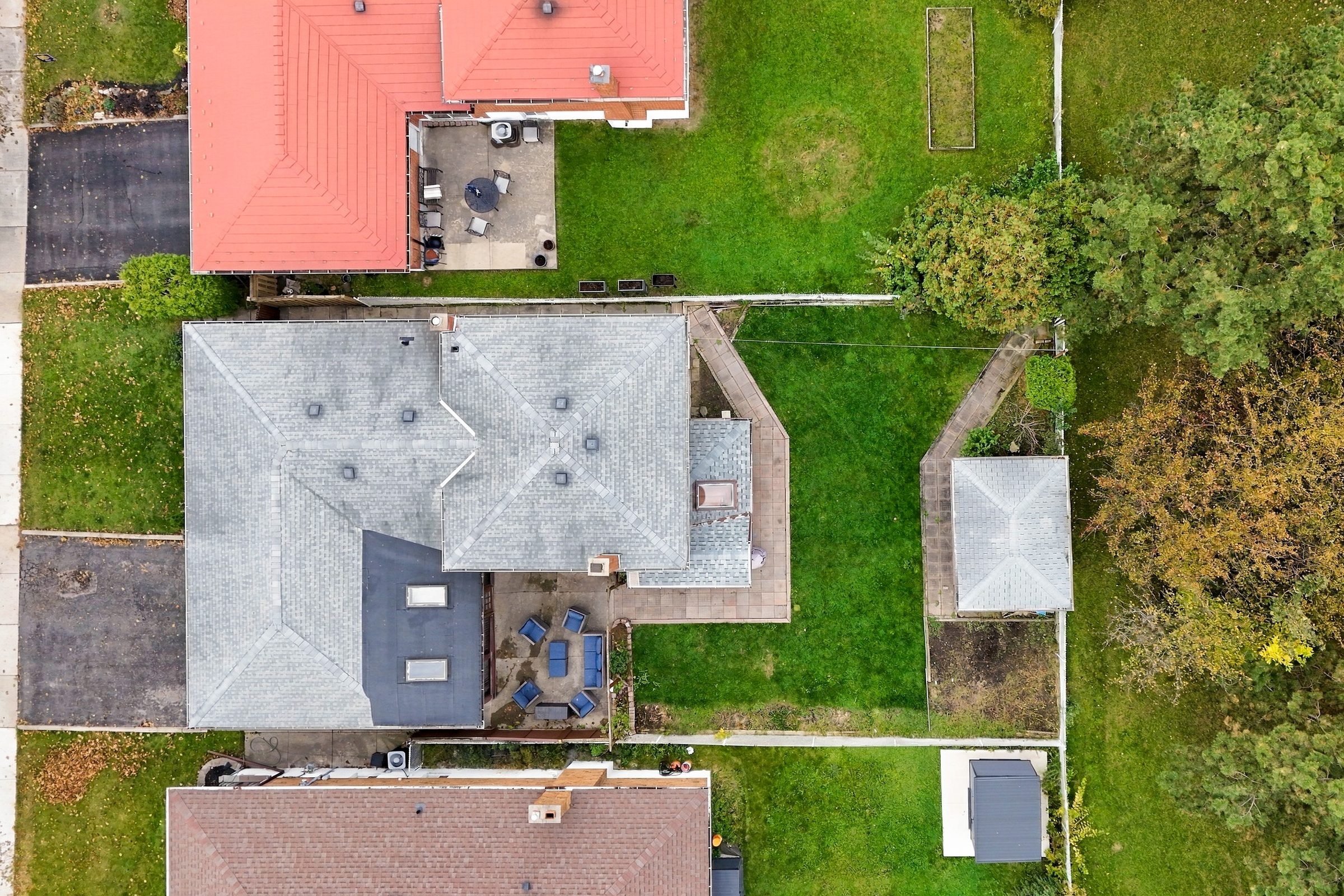 Overhead aerial of the house and fenced yard at 476 Michelle Row, Mississauga