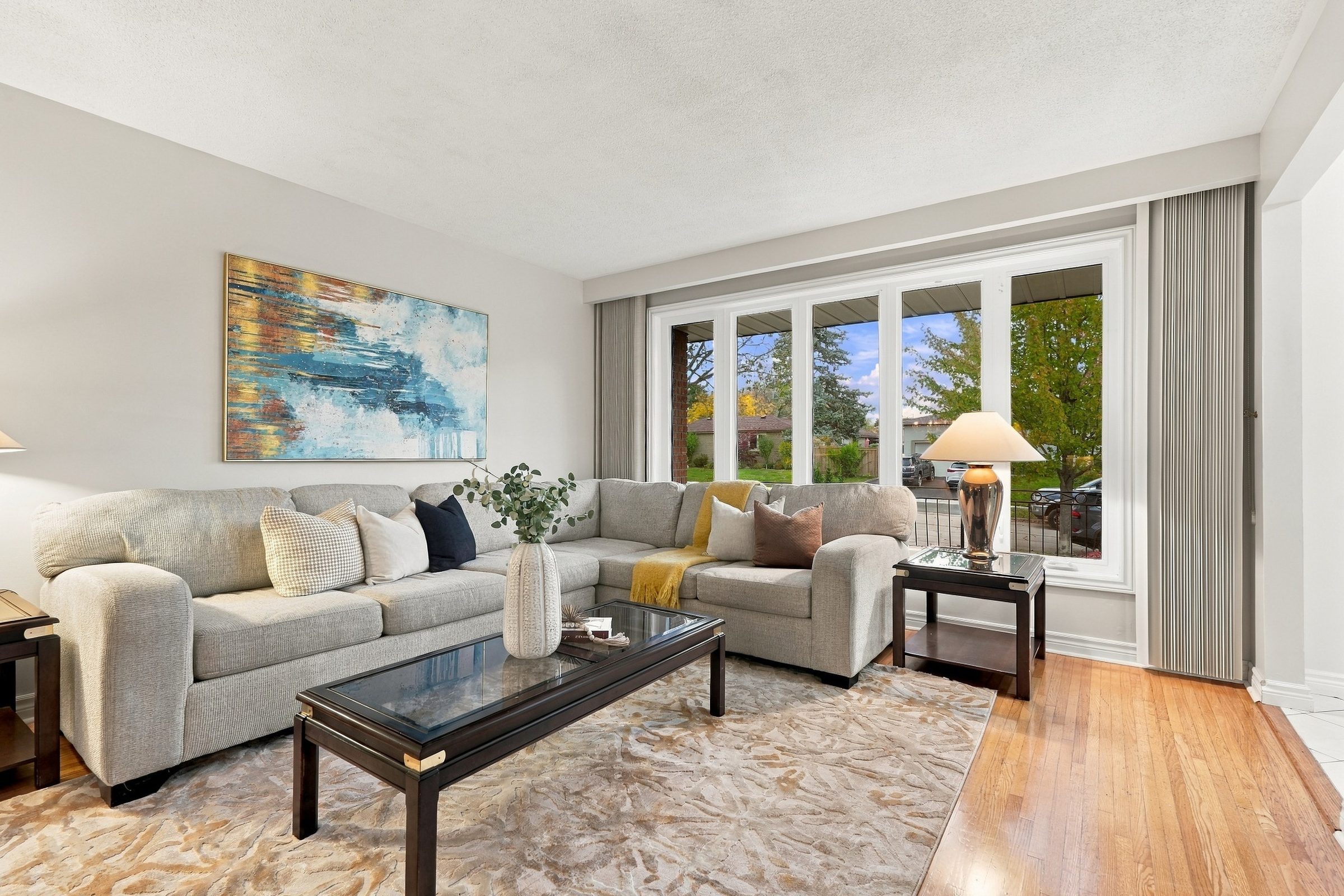 Living room with strip hardwood floors at 476 Michelle Row, Mississauga