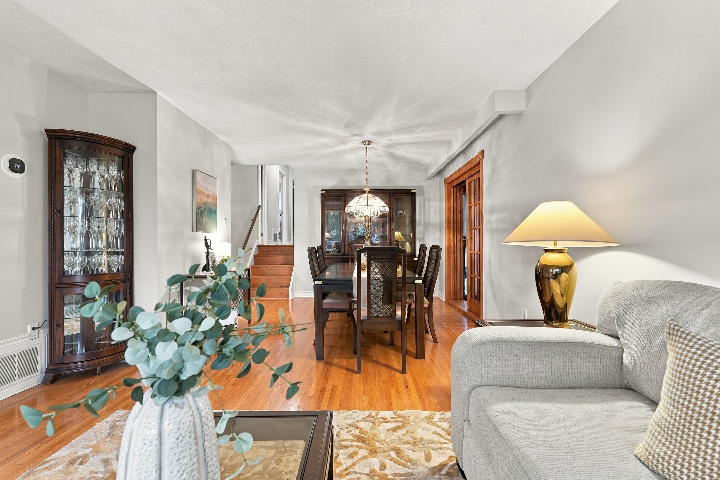 Living room looking toward the dining area at 476 Michelle Row, Mississauga
