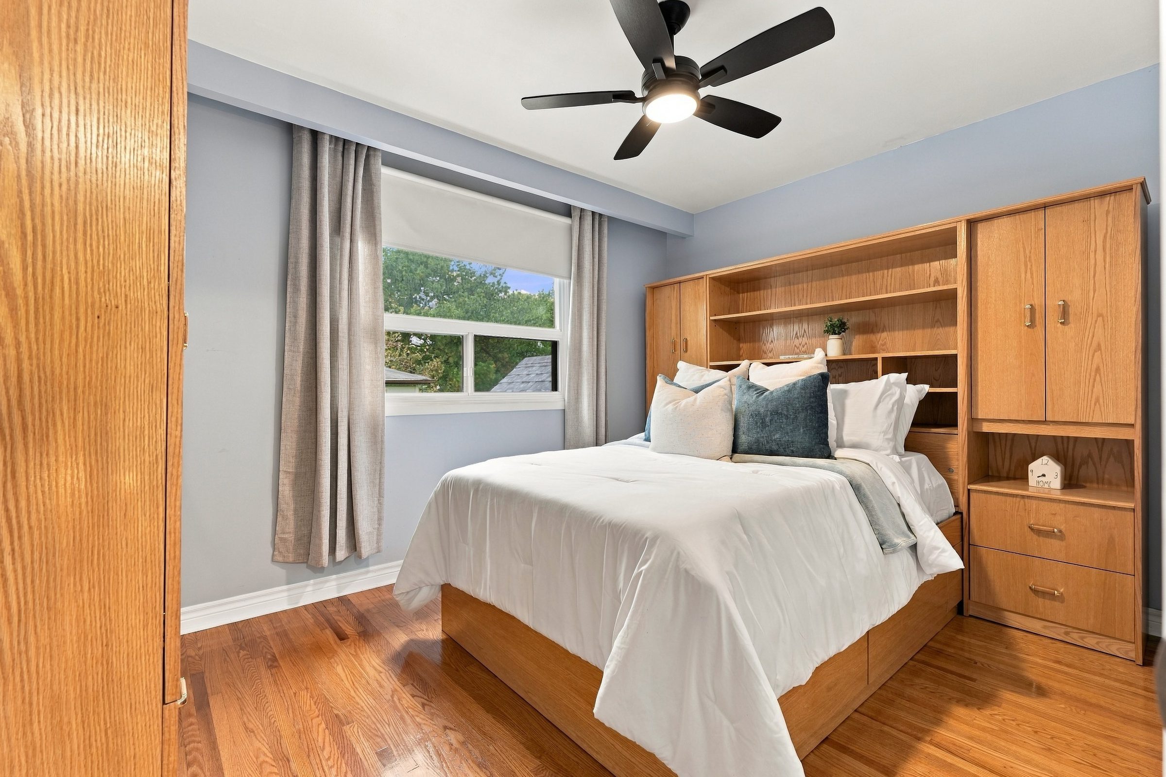 Second bedroom with built-in storage at 476 Michelle Row, Mississauga