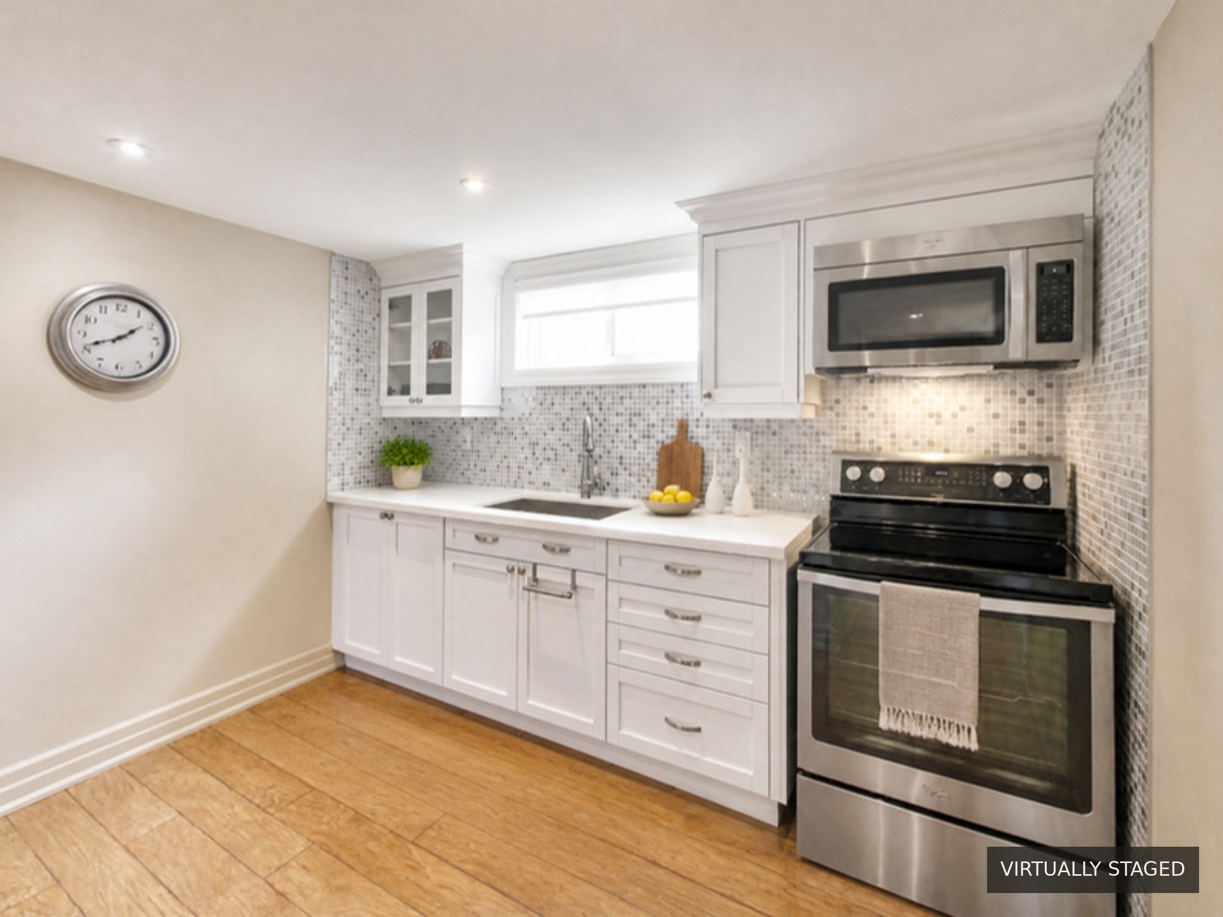 Kitchen, virtually staged, at 51 Norseman Street, Toronto