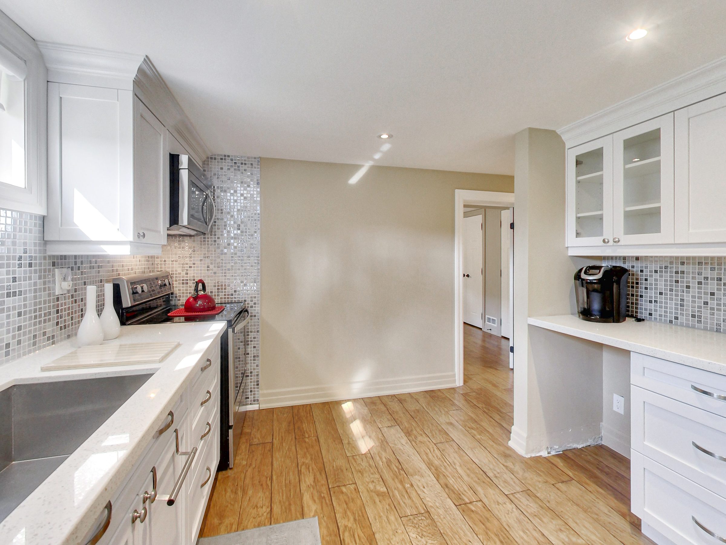 Kitchen looking toward the bedroom at 51 Norseman Street, Toronto