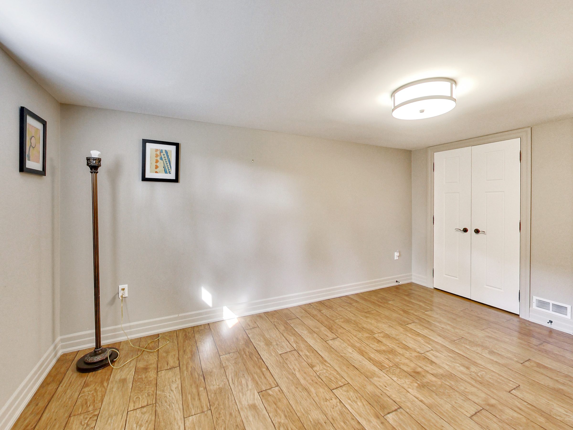 Bedroom and double closet at 51 Norseman Street, Toronto