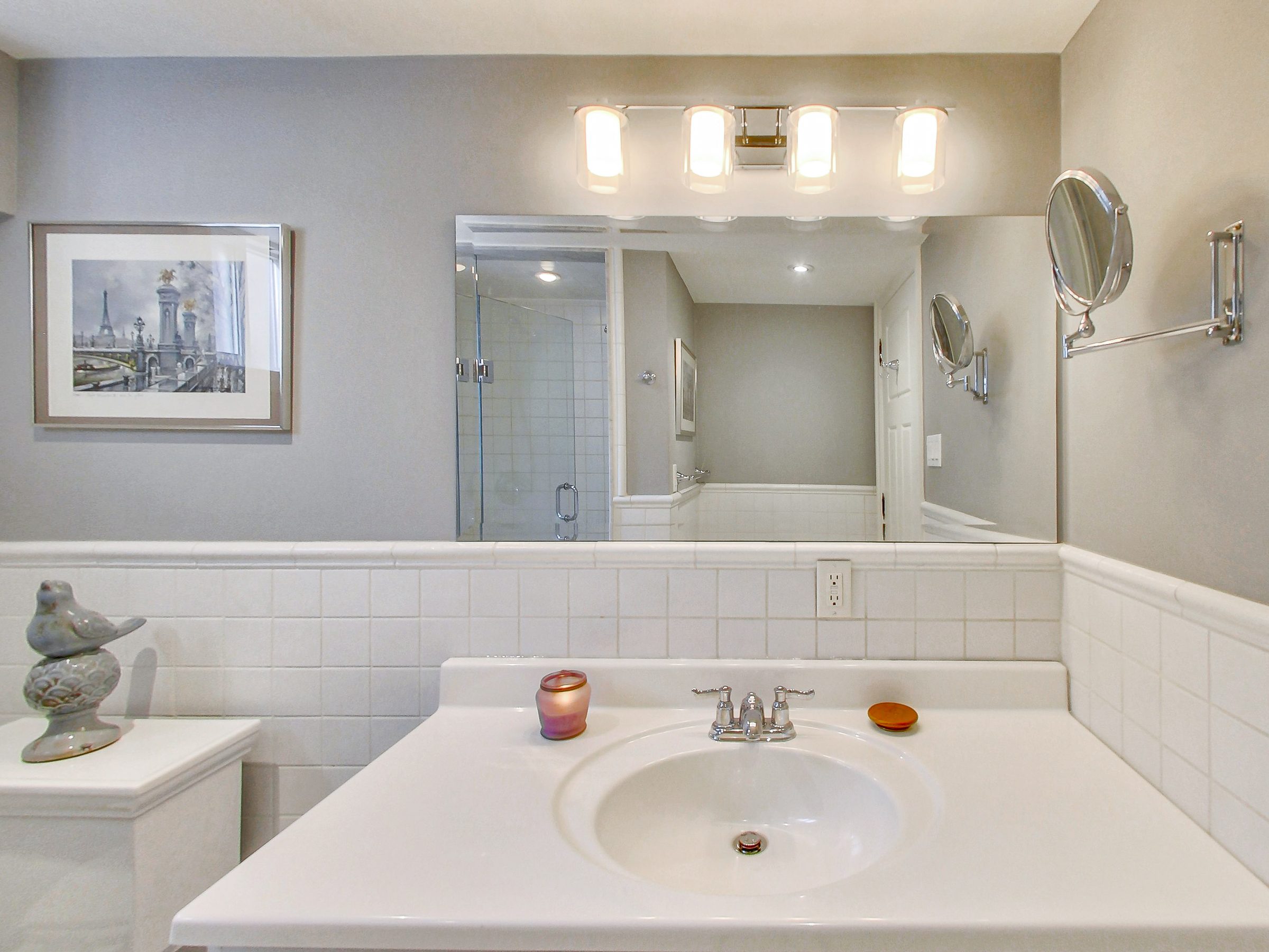Bathroom vanity and mirror at 51 Norseman Street, Toronto