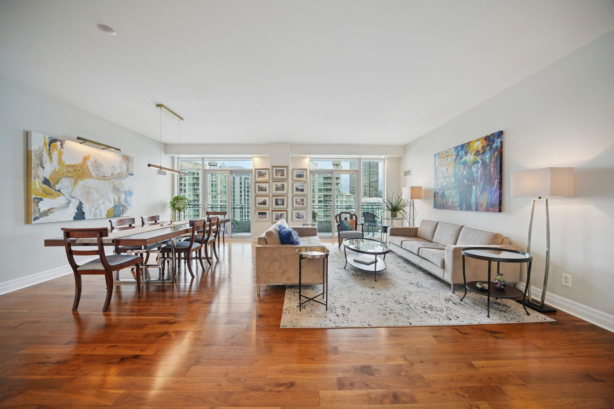 Open-concept living and dining with lake views