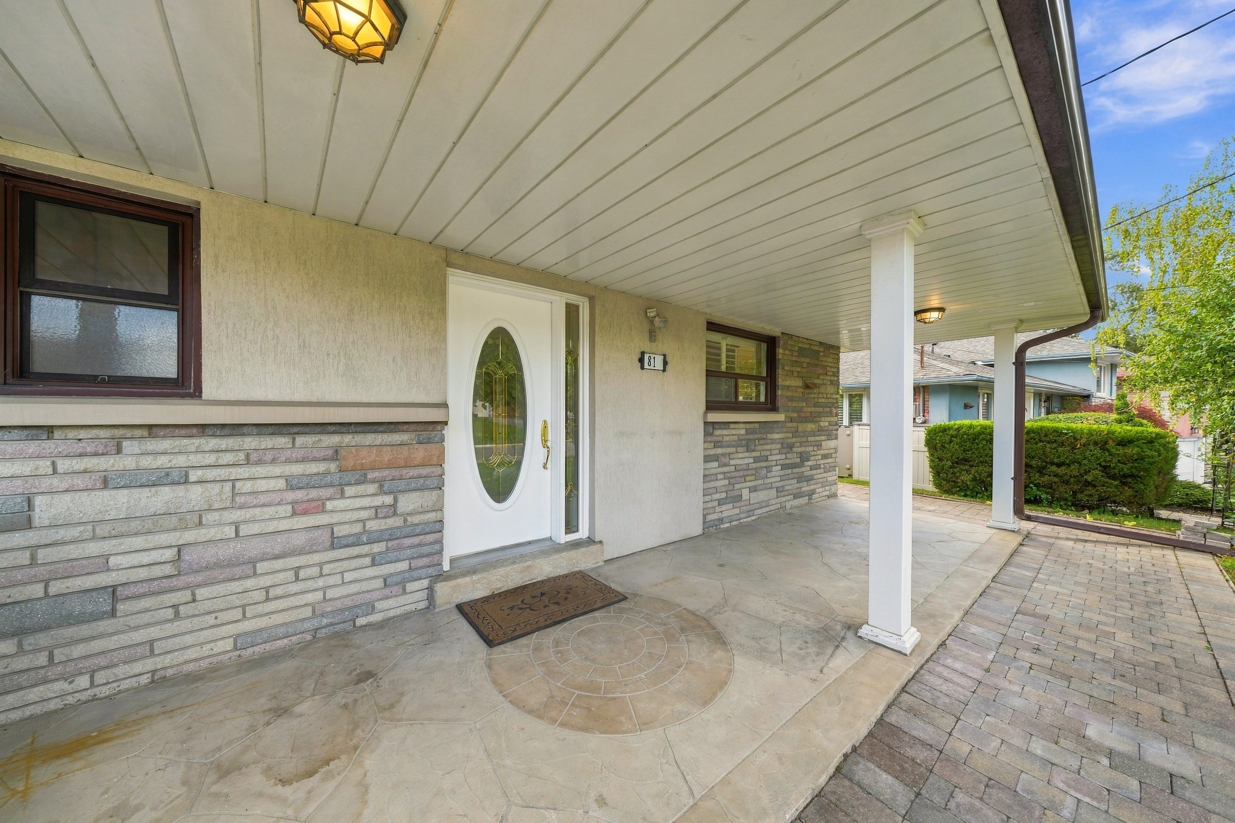 Covered front entry and carport