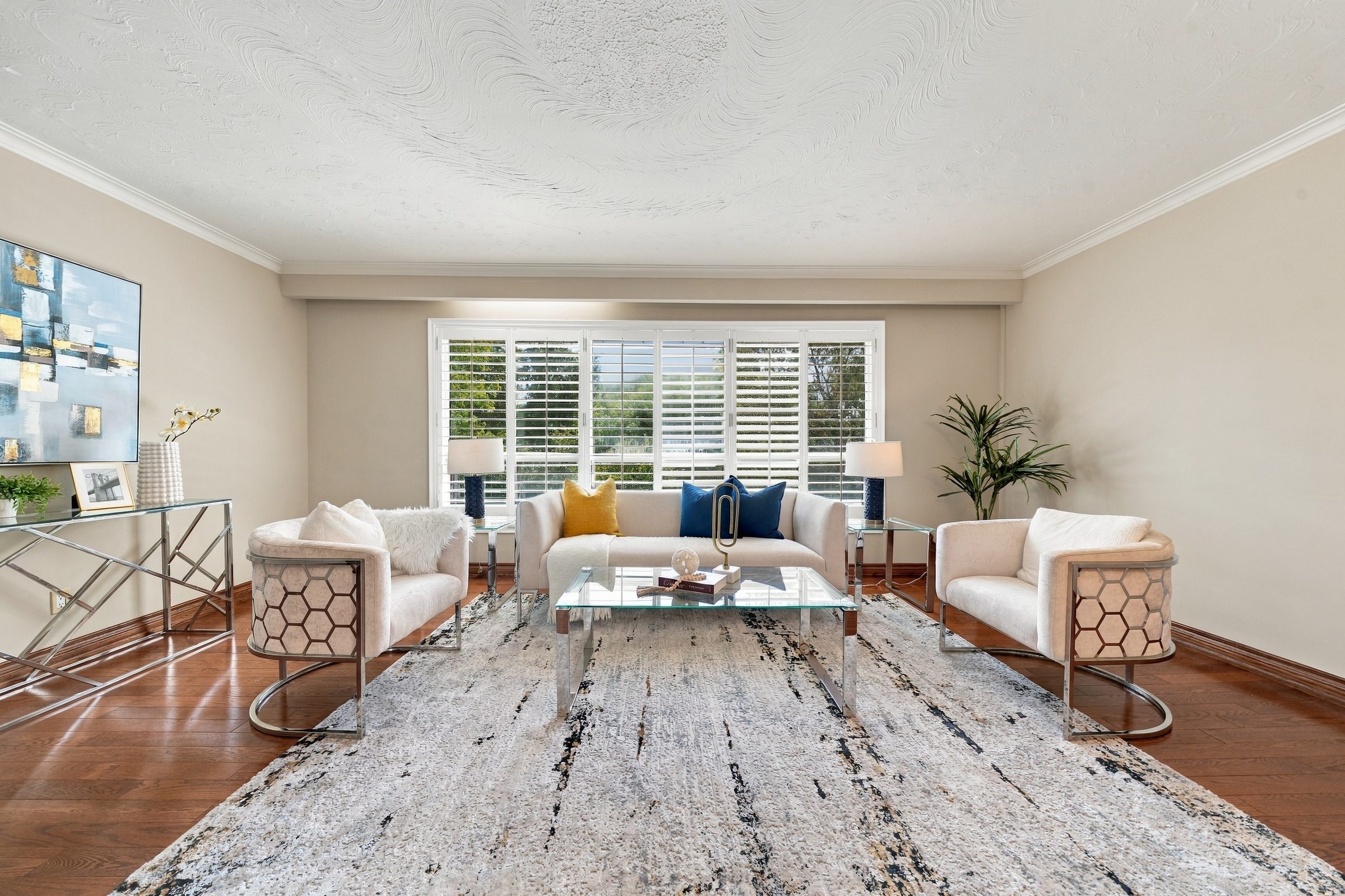 Living room with full-width windows at 81 Letchworth Crescent